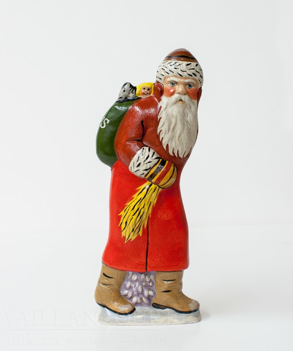 Father Christmas with teddy in back pocket
