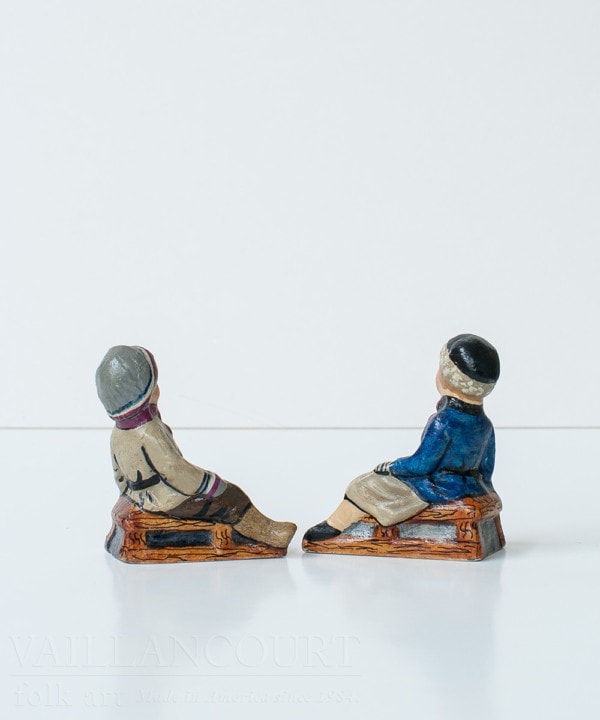 Tiny Boy and Girl on Sleds Pair