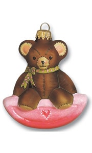 Classic teddy on pink rocker