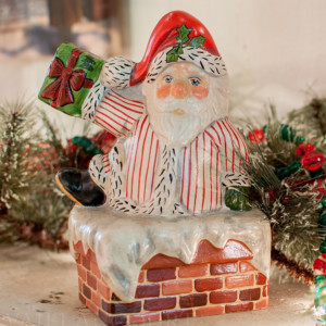 Striped Santa in Chimney With Present