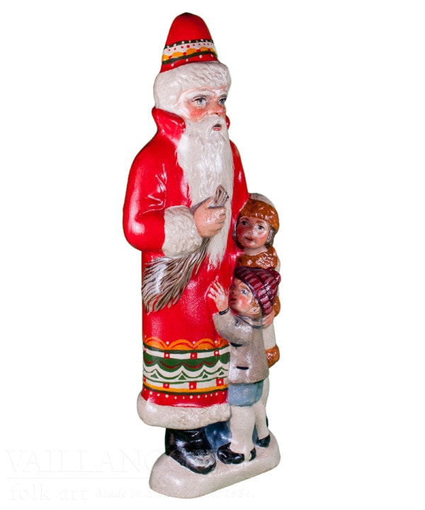 Father Christmas in Red Coat and Boy and Girl