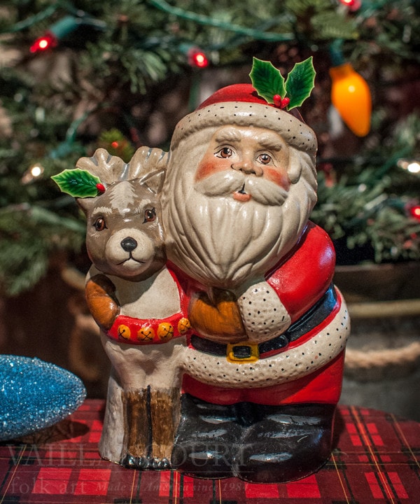 Santa Hugging Reindeer