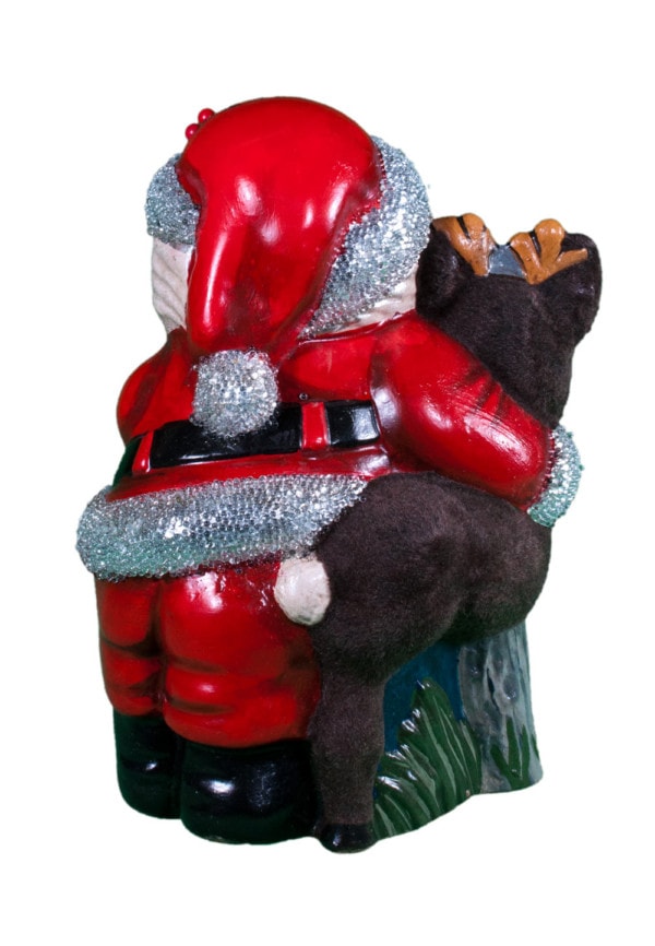 Santa Hugging Fuzzy Reindeer