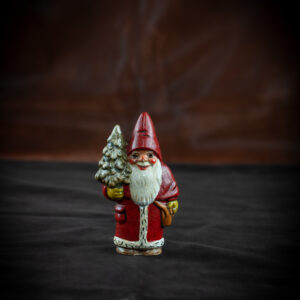 Small Gnome Holding Tree