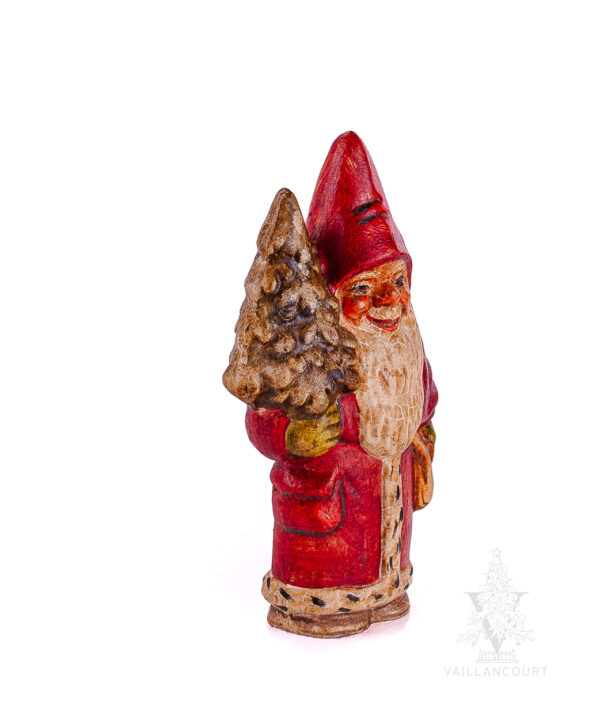 Small Gnome Holding Tree