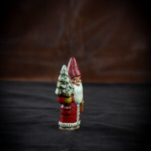 Small Gnome Holding Tree