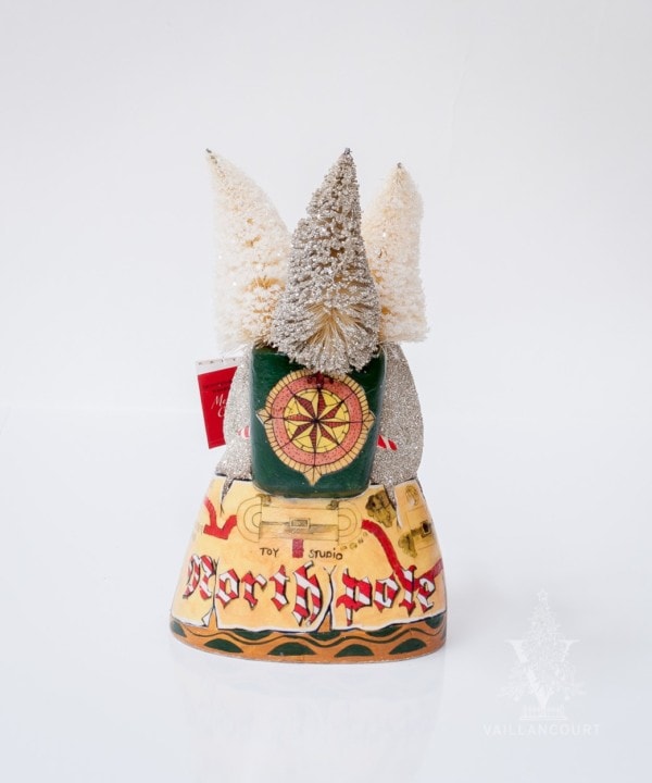 Shimmering North Pole Santa with Book and Trees