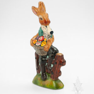 Rabbit Sitting on Fence with Eggs and Pipe