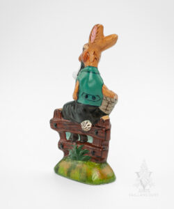 Rabbit Sitting on Fence with Eggs and Pipe