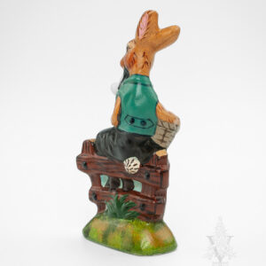 Rabbit Sitting on Fence with Eggs and Pipe