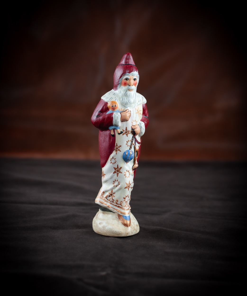 Victorian Father Christmas Carrying Doll
