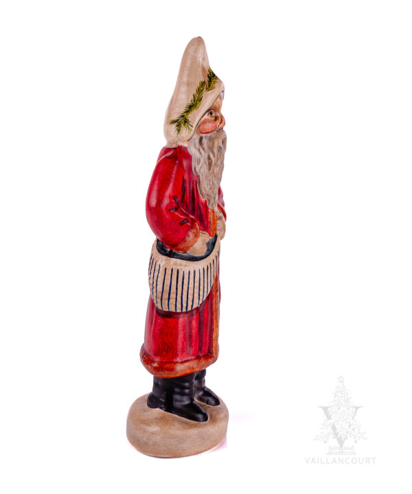 Father Christmas in Red Coat with Green and White Striped Bag