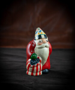 Santa with Switches Behind Back