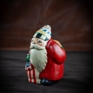 Santa with Switches Behind Back