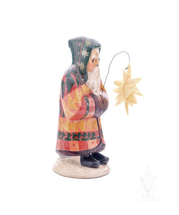9th Annual Starlight Santa Holding Hand-Folded Paper Moravian Star