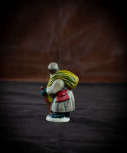 Belsnickel in Brown Coat with Switches and Stick