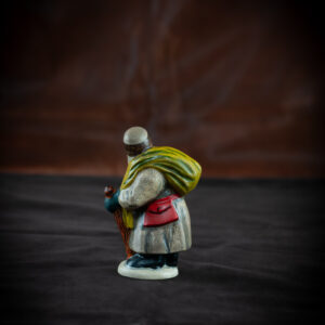 Belsnickel in Brown Coat with Switches and Stick