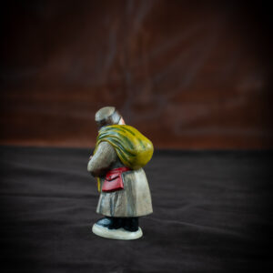 Belsnickel in Brown Coat with Switches and Stick