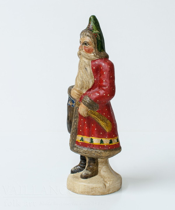 Father Christmas in Red Coat with White Dots and Soldier in Pocket