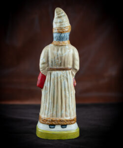 Father Christmas in a Tan Brocade Coat with Good and Bad Books