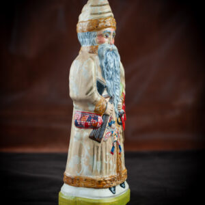 Father Christmas in a Tan Brocade Coat with Good and Bad Books