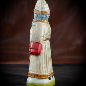 Father Christmas in a Tan Brocade Coat with Good and Bad Books