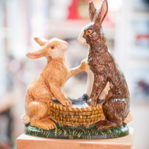 Two Rabbits Sitting Around Basket