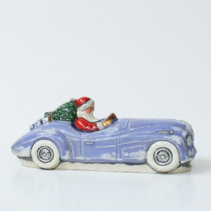 Santa in Jaguar with Bergdorf Gifts