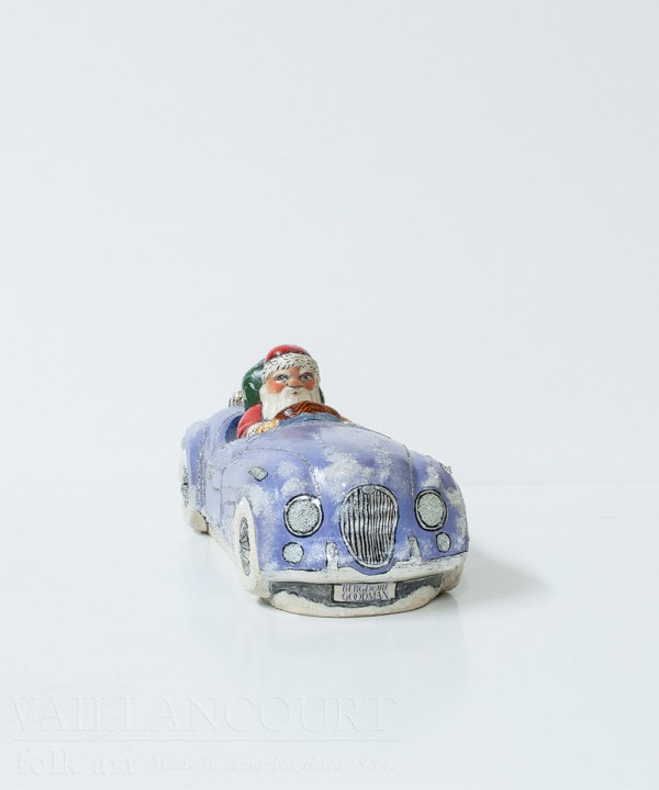 Santa in Jaguar with Bergdorf Gifts