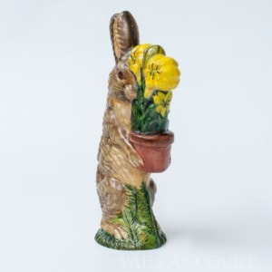 Bunny Carrying Yellow Lily In Clay Pot