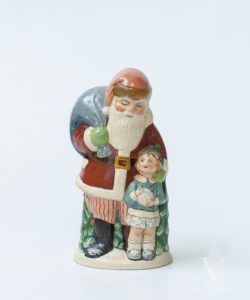 Santa with Girl Holding Snowball