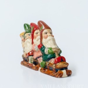 Three Gnomes and Angel on Sled