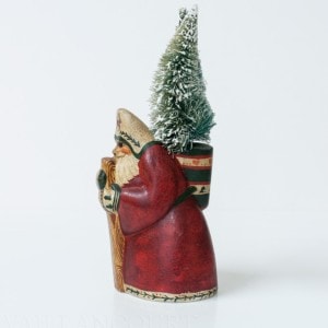 Father Christmas with Two Trees in His Sack