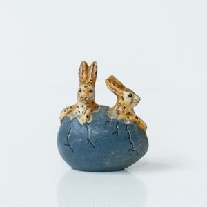 Two Tiny Bunnies in Cracked Blue Egg