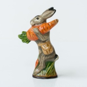 Small Rabbit Carrying Carrot Over Shoulder