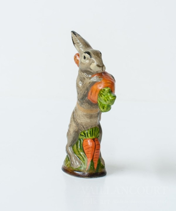 Small Rabbit Carrying Carrot Over Shoulder